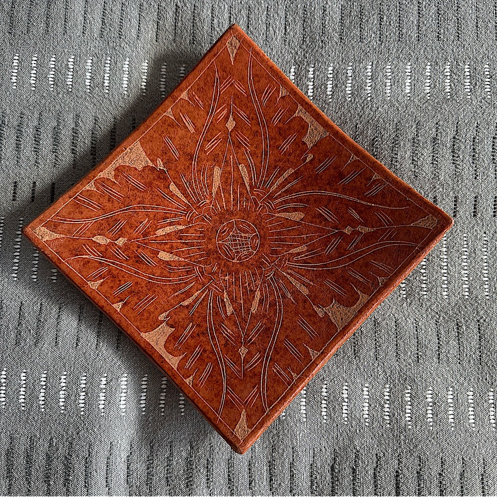 Brown shaded artistic pottery dish
for candle, jewelry, pocket items, drop zone
